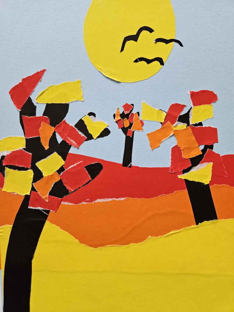 Krajobraz podzielony jest na trzy plany, w których umieszczone są kształty drzew z liśćmi. Centralnie na niebie żółte słońce.