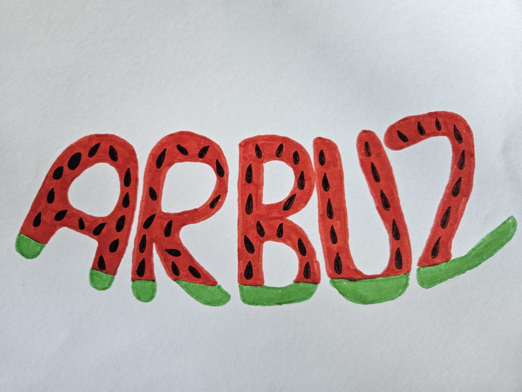 Na rysunku wyraz wykonany mazakami - "Arbuz"