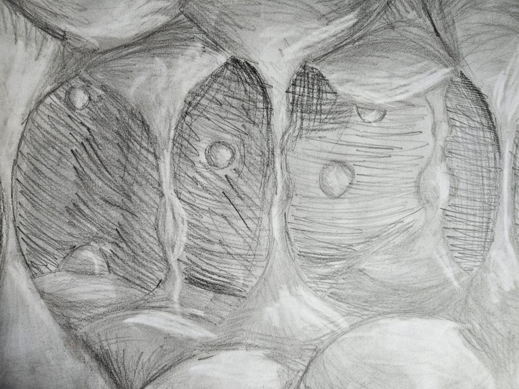 Na rysunku trudne do okreslenia kształty przypominające grotę z kulami i zaciekami