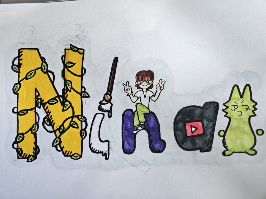 Na pracy wielokolorowe, ozdobne słowo "Nina"