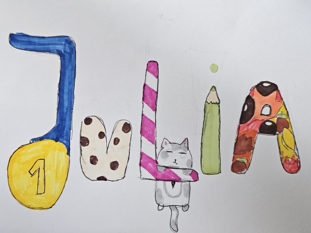 Na pracy wielokolorowy, ozdobny wyraz "Julia"